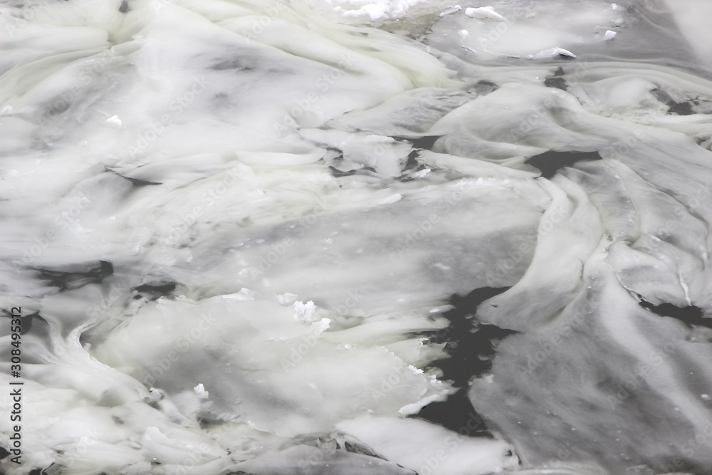 Young floating ice on the river surface Young floating ice on the river surface