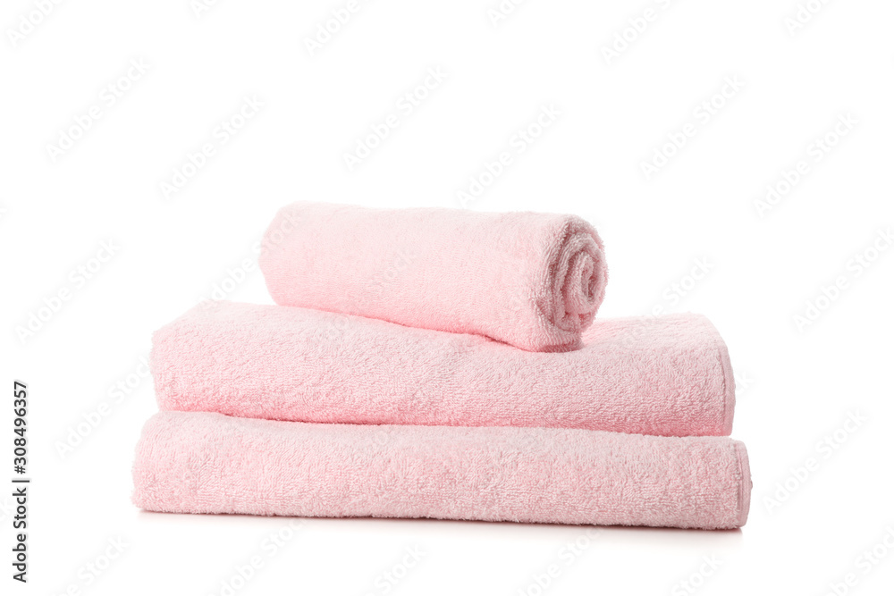 Folded fresh pink towels isolated on white background Folded fresh pink towels isolated on white background
