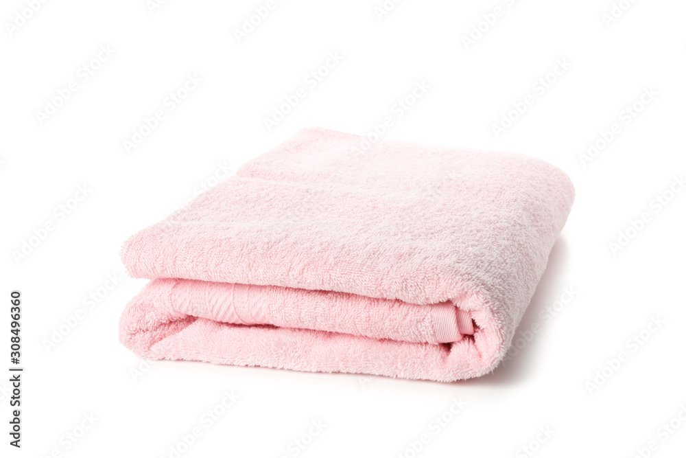 Folded pink towel isolated on white background, close up Folded pink towel isolated on white background, close up
