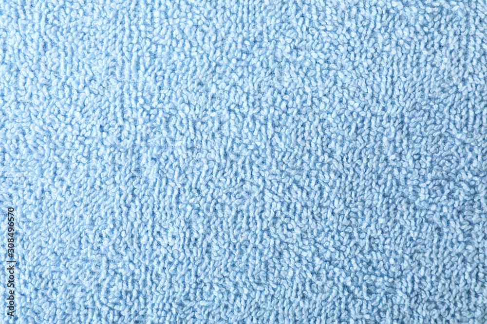 Blue towel textured background, closeup and space for text Blue towel textured background, closeup and space for text