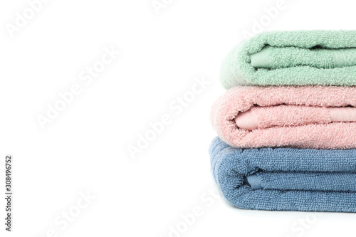 Stack of color towels isolated on white background