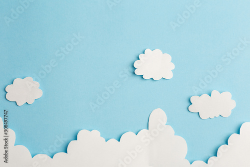 beautiful blue background with light clouds of paper