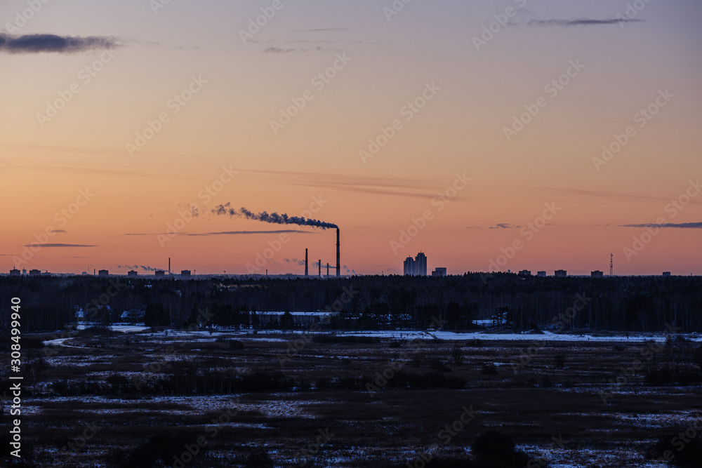 dramatic winter sunrise over city of Riga in Latvia