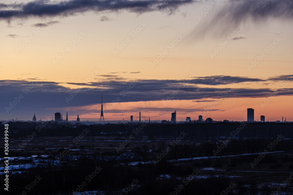 dramatic winter sunrise over city of Riga in Latvia dramatic winter sunrise over city of Riga in Latvia