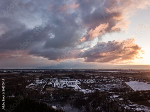 dramatic winter sunrise over city of Riga in Latvia