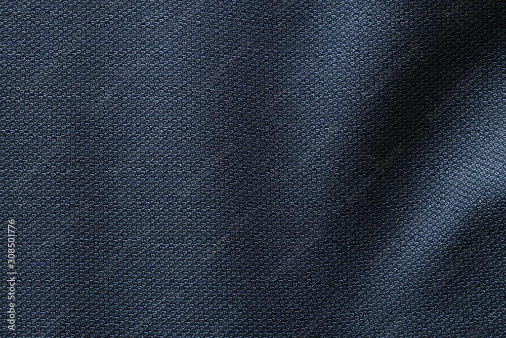 Close up shot of midnight dark blue formal suit cloth textile surface. wool fabric texture for important luxury evening or night event. Wallpaper and background with copy space for text Close up shot of midnight dark blue formal suit cloth textile surface. wool fabric texture for important luxury evening or night event. Wallpaper and background with copy space for text