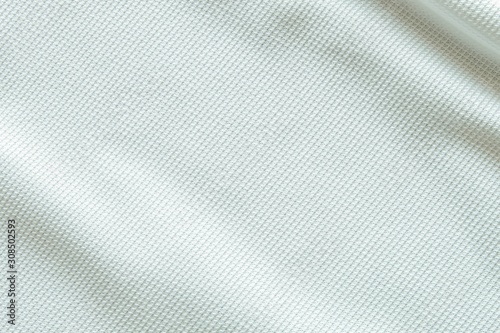 White grey fabric close up shot of Cotton and polyester Polo shirt. Casual wear over the weekend or summer time season. Background texture concept with copy space for text.