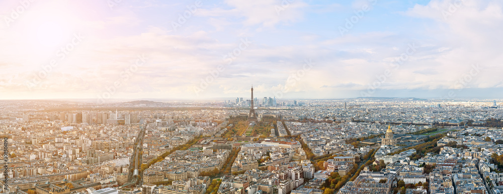 Eiffel tower and Paris city view form Montparnasse tower panorama. Sunny autumn day. Aerial panormic view of Paris skyline.