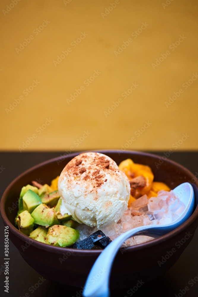 Bowl of fruid salad with ice cream Bowl of fruid salad with ice cream