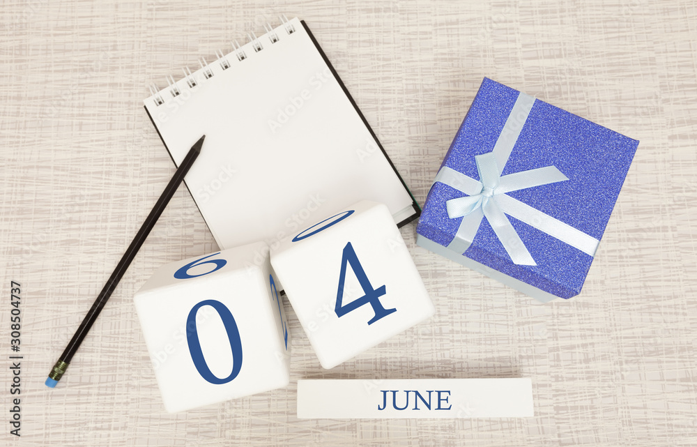 Calendar with trendy blue text and numbers for June 4 and a gift in a box.