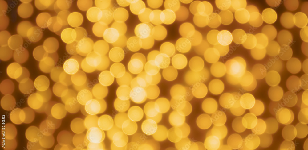 Abstract blur golden bokeh light Christmas holiday background