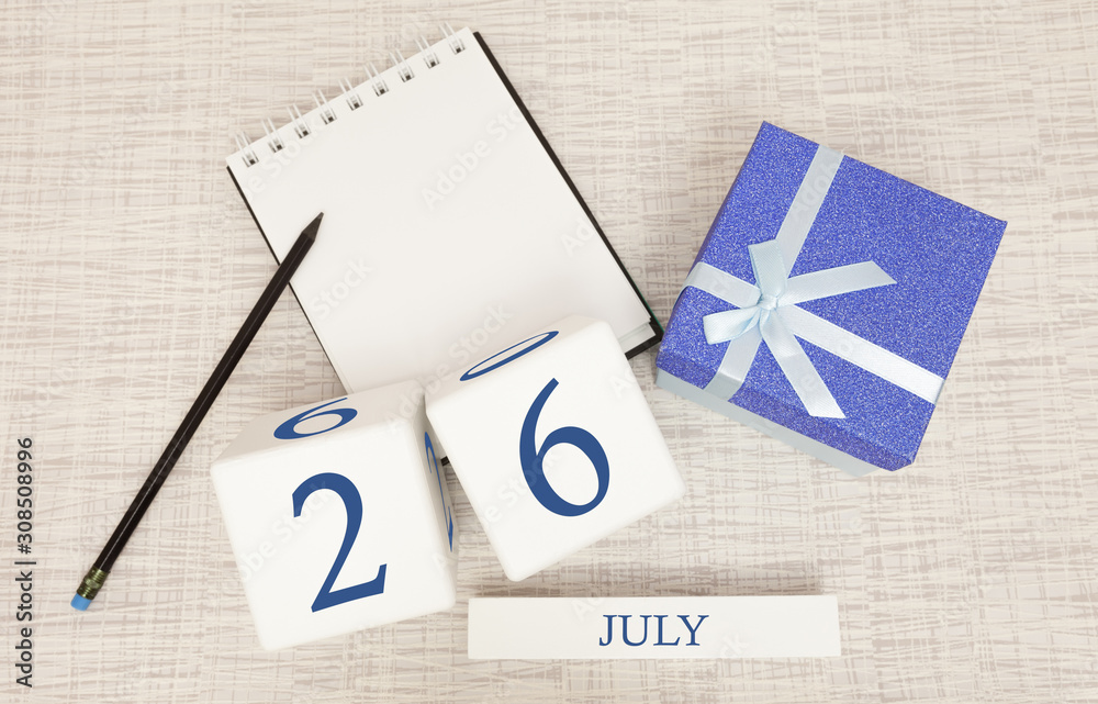 Calendar with trendy blue text and numbers for July 26 and a gift in a box.
