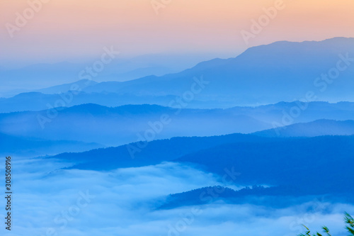 Beautiful fog coverage mountain valley and sunlight in the morning colorful,Sri Nan Park,Nan,Thailand