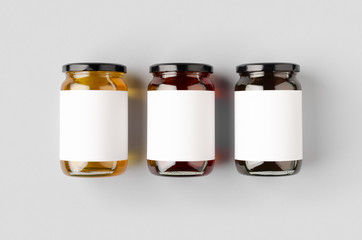 Honey jars mockup with blank label. Three different colors.