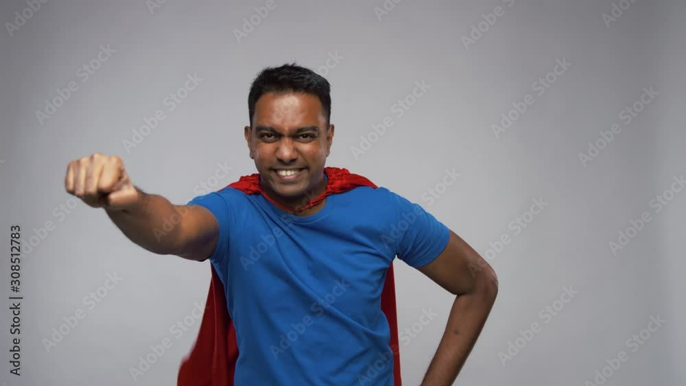 super power and people concept - flying indian man in red superhero cape over grey background super power and people concept - flying indian man in red superhero cape over grey background