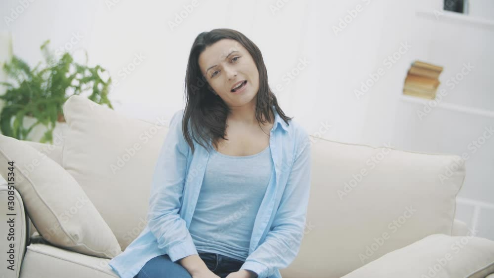 Beautiful pretty cute and funny woman is smiling widely and feeling fine. Funny woman is showing tongue, isolated on white background. Slow motion. 4K. Beautiful pretty cute and funny woman is smiling widely and feeling fine. Funny woman is showing tongue, isolated on white background. Slow motion. 4K.