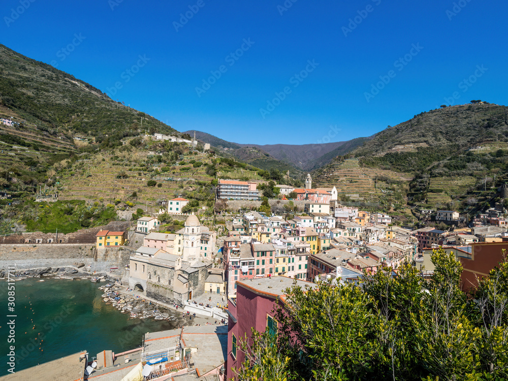 View of Vernazza one of five famous colorful villages of Cinque Terre UNESCO National Park in Italy, suspended between sea and land on sheer cliffs
