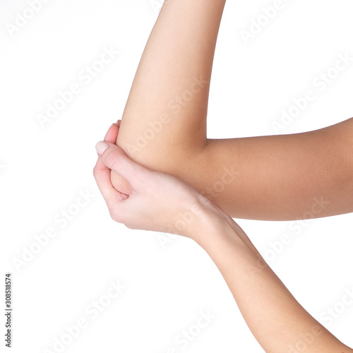  Save Download Preview Closeup woman hand holding elbow with pain on white background, health care and medical concept