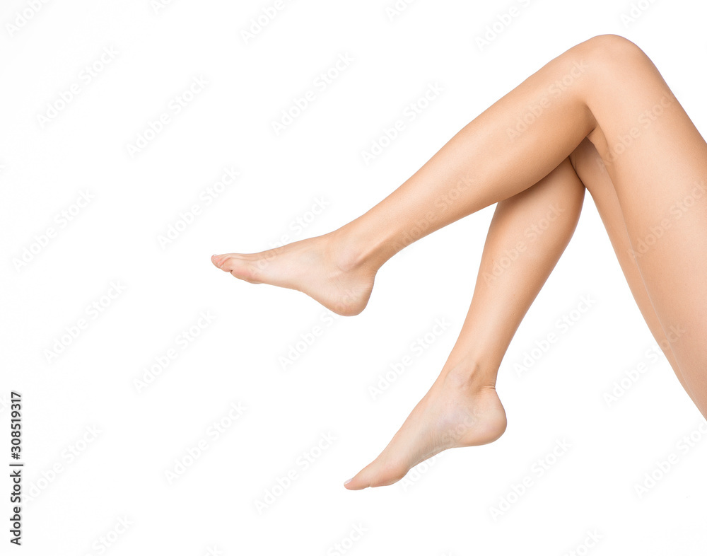 Long pretty woman legs isolated on white
