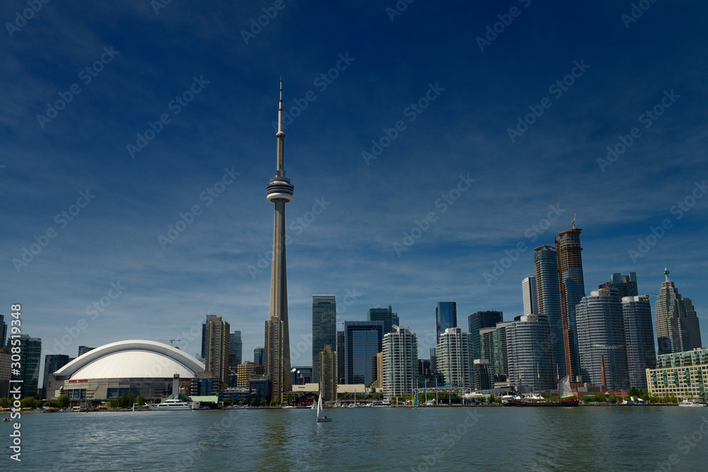 Toronto skyline with CN Tower Rogers Centre condo and financial towers from Lake Ontario