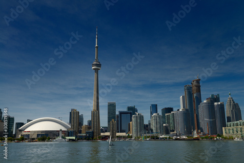 Toronto skyline with CN Tower Rogers Centre condo and financial towers from Lake Ontario