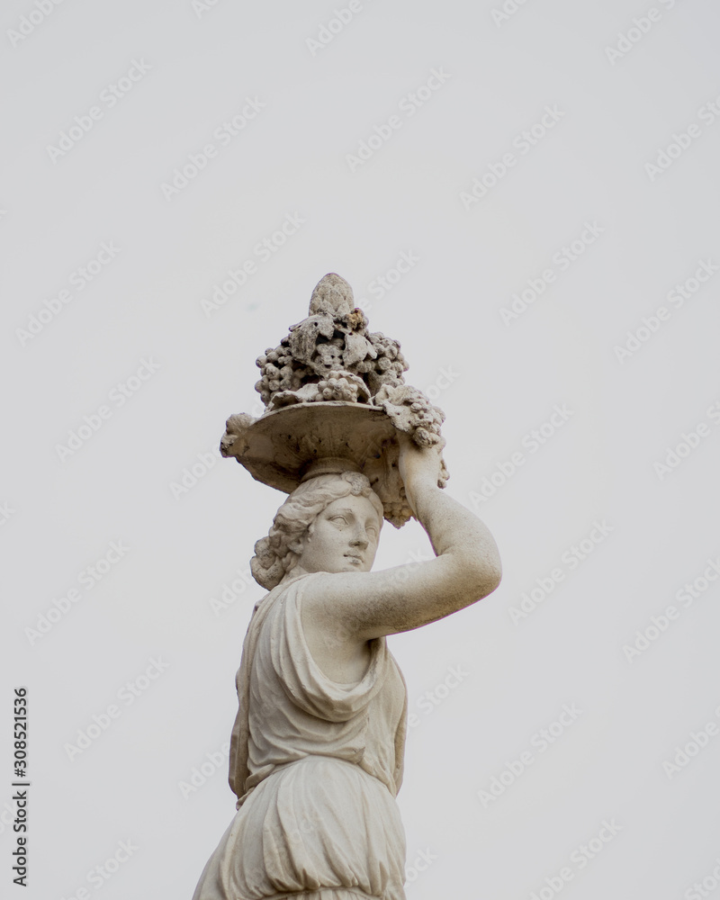 statue of an angel on white background