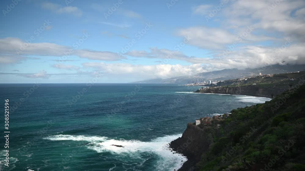 Scenic view of the Atlantic Ocean waves and rocky shore - a view from Anaga park Scenic view of the Atlantic Ocean waves and rocky shore - a view from Anaga park
