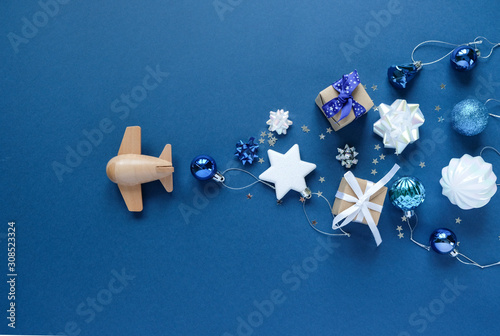 Wallpaper Mural wooden children's plane on a classic blue background Torontodigital.ca