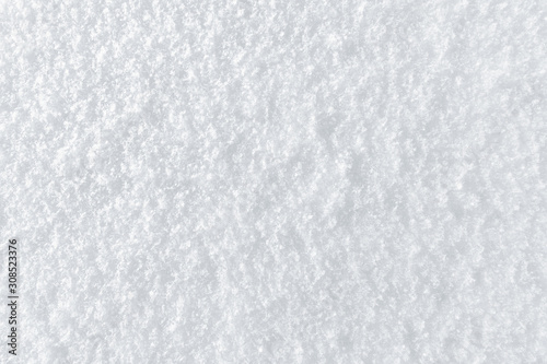 Fresh snow background with small snowflakes texture