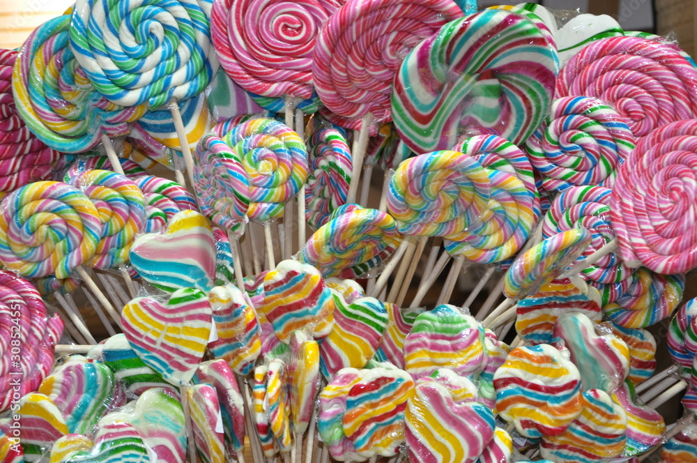 Sweets and treats close up photo, colorful caramel lolipops,sweet candy.