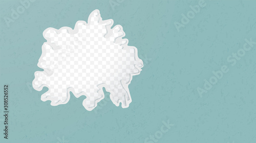 A hole in the ripped recycled paper background. Cardboard or paperboard kraft paper frame