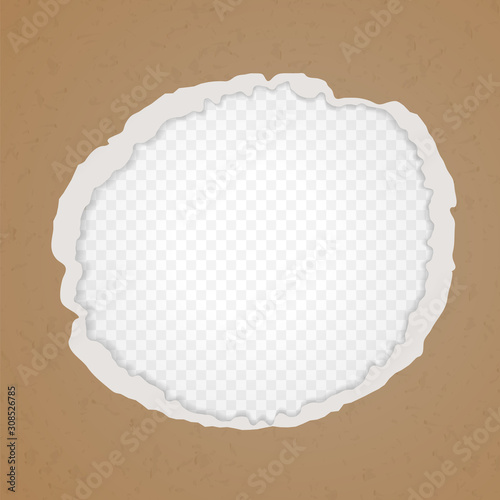 A hole in the cardboard. Background of ripped recycled paper.