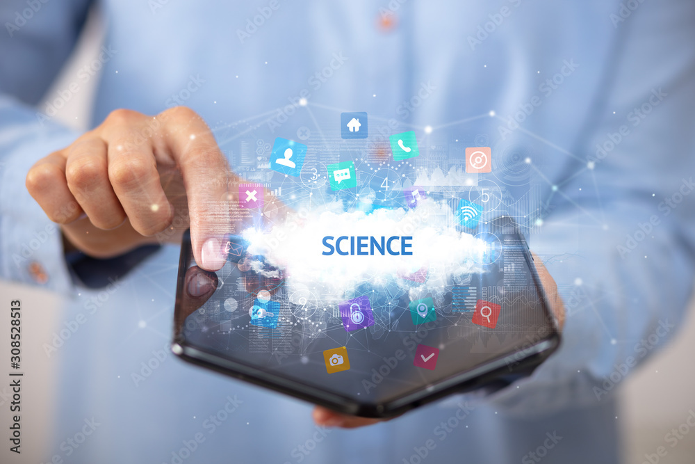 Businessman holding a foldable smartphone with SCIENCE inscription, technology concept Businessman holding a foldable smartphone with SCIENCE inscription, technology concept
