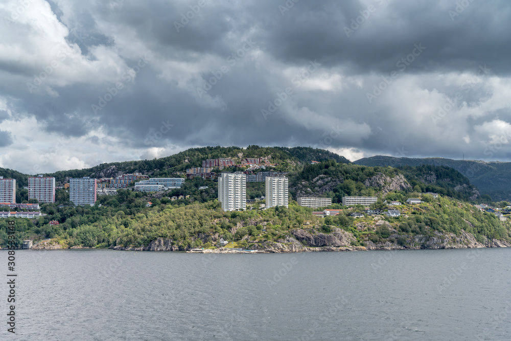 high rise block of flats on fjord shore, Bergen outskirts, Norway