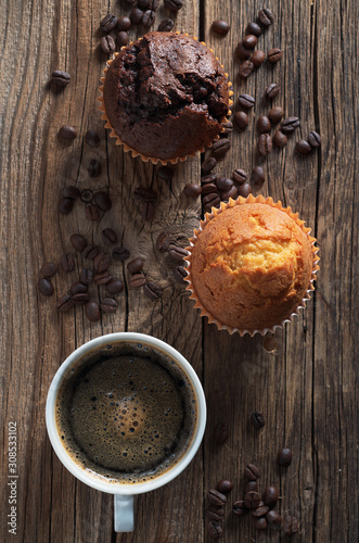 Two muffins and coffee cup