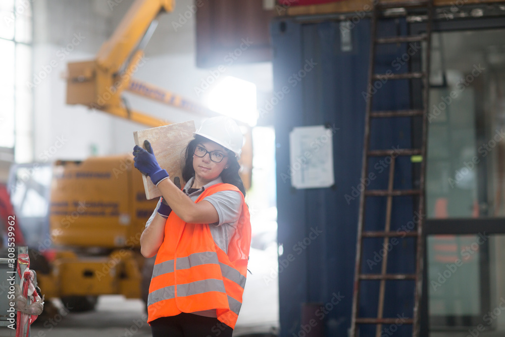 storekeeper female in a warehouse storekeeper female in a warehouse