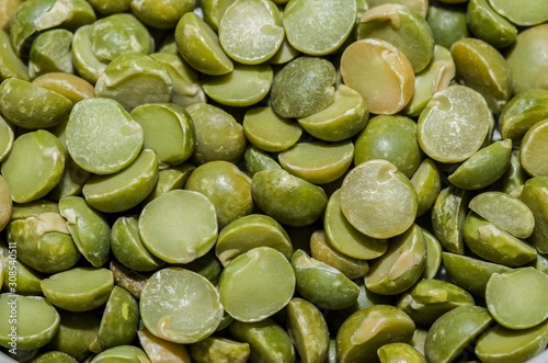 Background with peas in the foreground