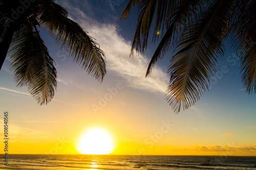 Fototapeta Naklejka Na Ścianę i Meble -  Sunset on a beach of the city of Sao Luis do Maranhão, Maranhão, Brazil