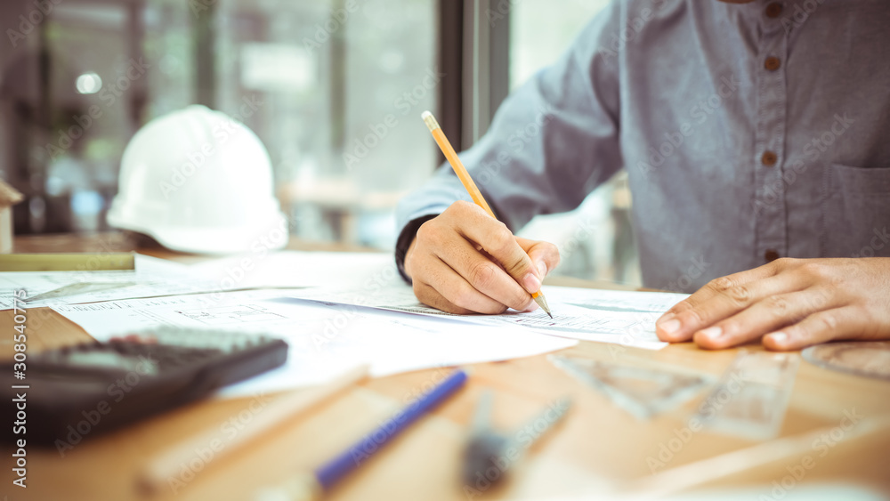 Architect or engineer working in office Architect or engineer working in office