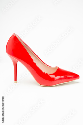 women's patent high heeled shoes red color isolated on white background