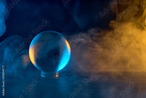 crystal ball in blue-orange smoke