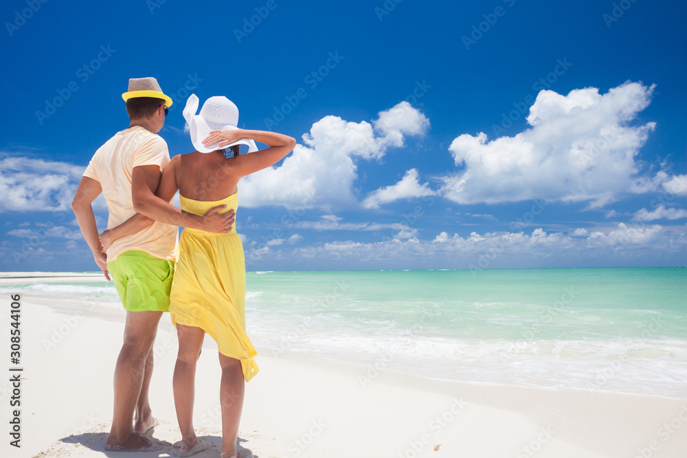 Attractive Young Couple on Tropical Beach. Cayo Largo, Cuba Attractive Young Couple on Tropical Beach. Cayo Largo, Cuba