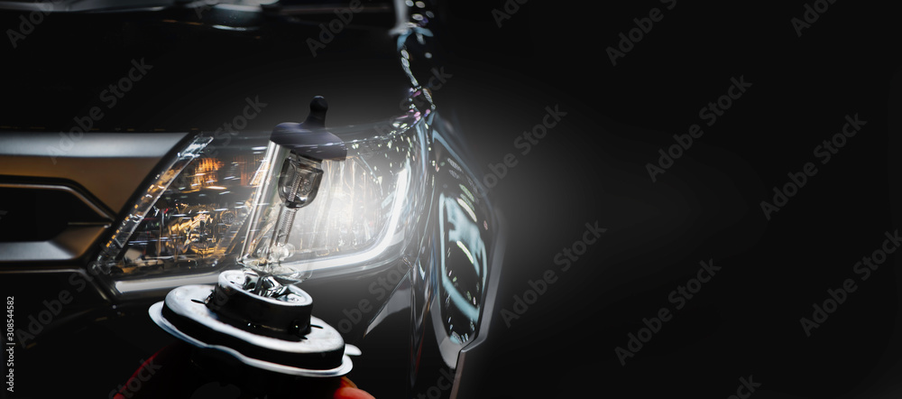 Modern sport car headlight with flare on the road.	 - obrazy, fototapety, plakaty 
