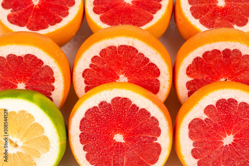 Pomelo and grapefruit slices background.