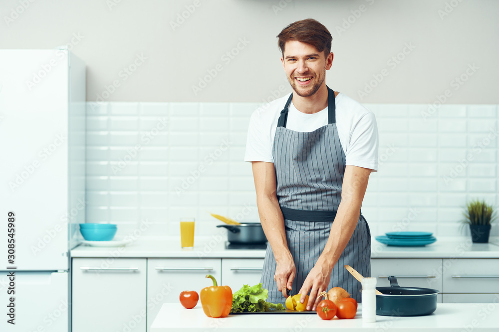 woman cutting vegetables in the kitchen
