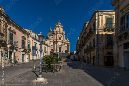 View of the baroque church San Giorgio and the empty square Piazza Duomo in the historical center of Ragusa Ibla in Sicily, Italy