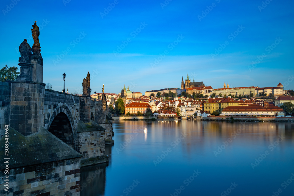The early morning sun lights up St. Vitus Cathedral and Prague Castle, Prague, Czech Republic The early morning sun lights up St. Vitus Cathedral and Prague Castle, Prague, Czech Republic