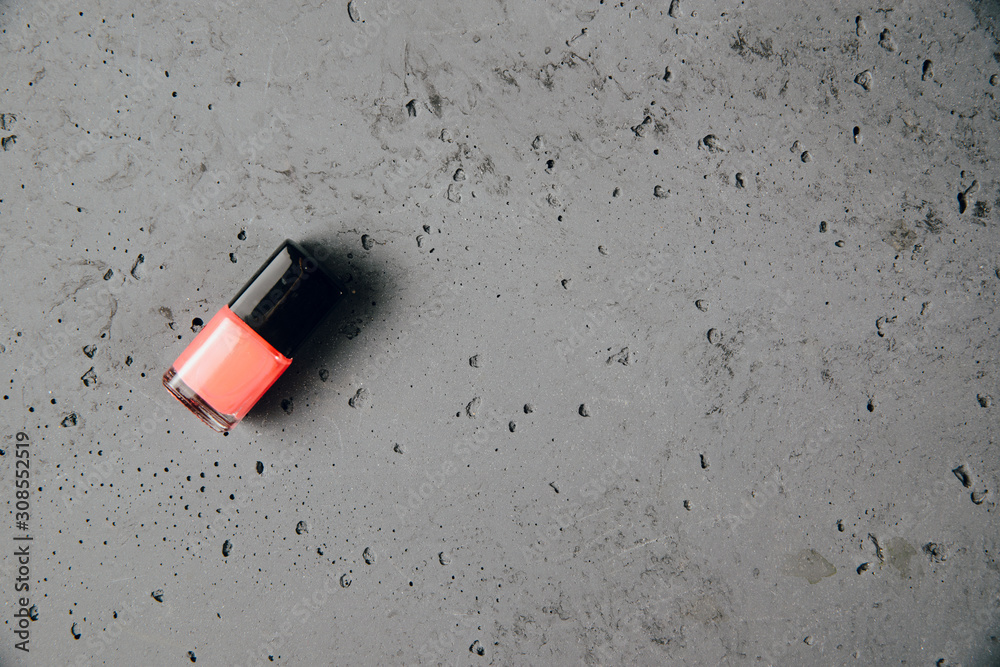 Nail polish on a stone countertop. The concept of doing makeup, caring for the appearance of women. Preparing women to leave. Nail polish on a stone countertop. The concept of doing makeup, caring for the appearance of women. Preparing women to leave.