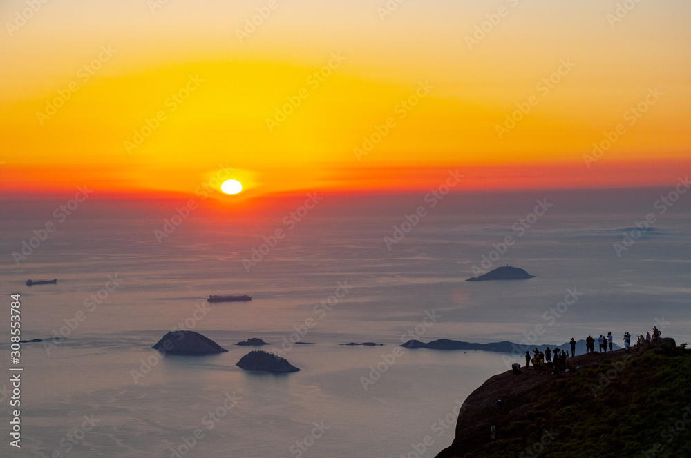 Obraz premium Sunrise at the top of Pedra da Gávea with panoramic views of the city of Rio de Janeiro. Brazil