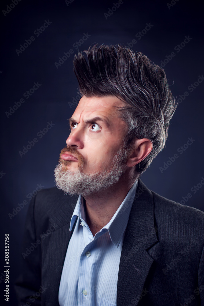 A portrait of bearded man with iroquois wearing suit A portrait of bearded man with iroquois wearing suit